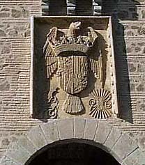 Puerta de Alcántara, escudo de los Reyes Católicos