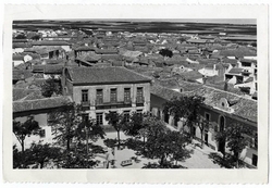 Lillo. Vista parcial desde la plaza y caserio. 1959 (P-433)